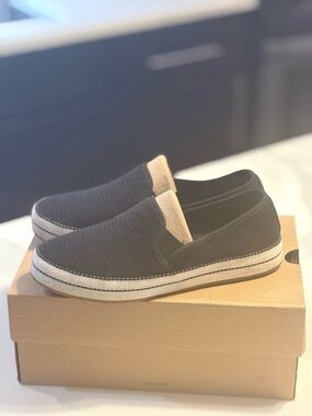UGG Black Slip-On Casual Flats with White Trim
